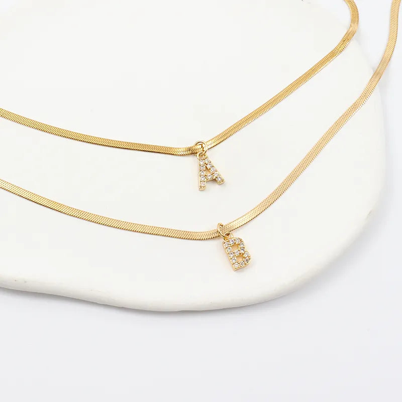 Collier en Herringbone avec Initiale en Diamant Melly®