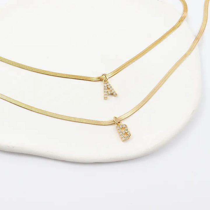 Collier en Herringbone avec Initiale en Diamant Melly®